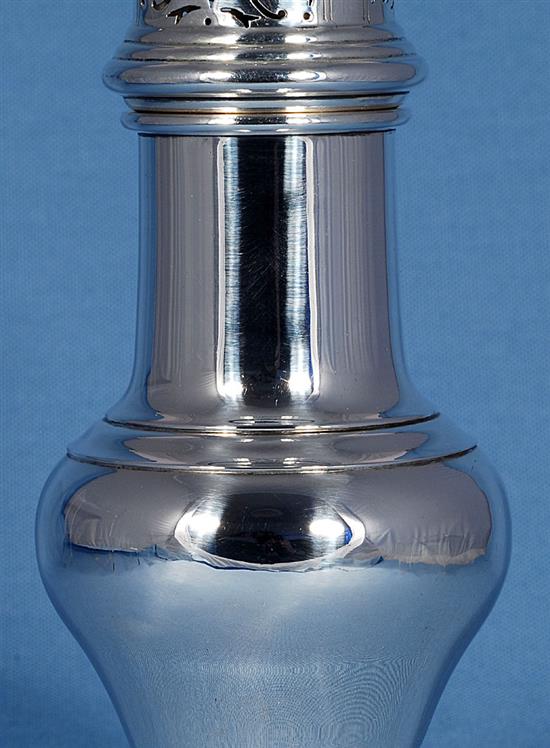 A George V silver sugar caster, Height 9 ½”/242mm Weight 8.4oz/238grms.